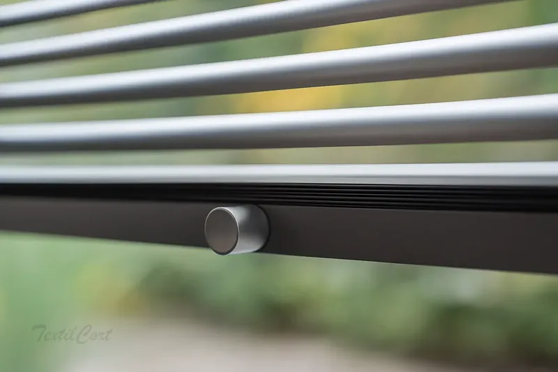 Detalle veneciana con botón TextilCort