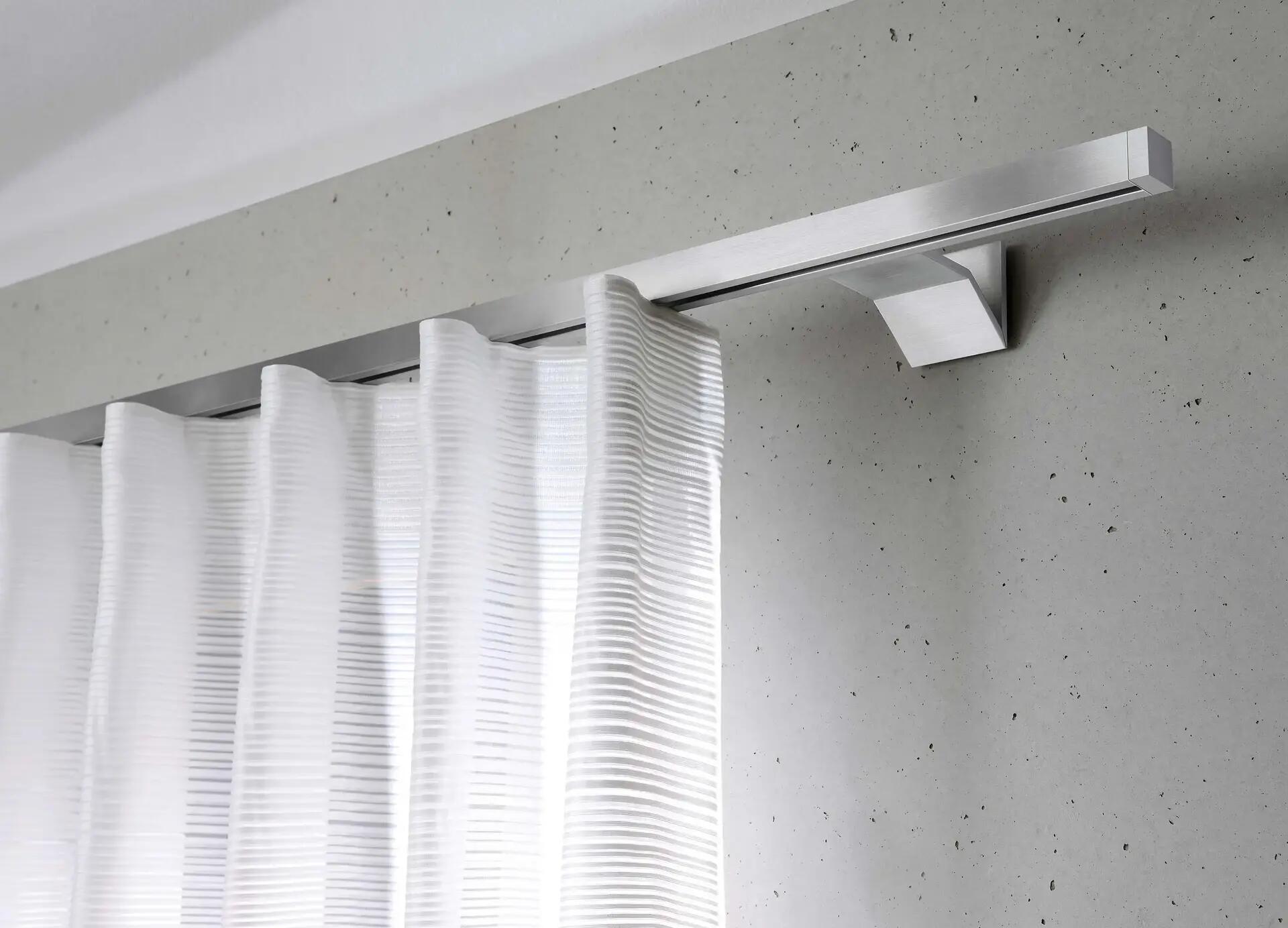 Sistema riel de cortinas decorativo Compac