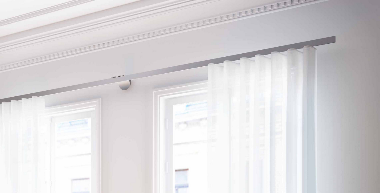 Sistema riel de cortinas decorativo Wing